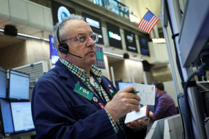 Futures-options traders work on the floor at the New York Stock Exchange's NYSE American in New York City, U.S., October 22, 2025. REUTERS/Brendan McDermid