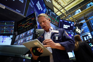 Traders work on the floor at the New York Stock Exchange (NYSE) in New York City, U.S., June 8, 2026.  REUTERS/Brendan McDermid