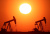The sun sets behind oil pumps outside Vaudoy-en-Brie, near Paris, France, March 18, 2026. REUTERS/Christian Hartmann