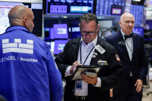 A trader works on the floor of the New York Stock Exchange (NYSE) in New York City, U.S., August 19, 2026. REUTERS/Jeenah Moon