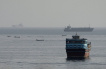 FILE PHOTO: Vessels in the Strait of Hormuz, as seen from Musandam, Oman, August 3, 2026. REUTERS/Stringer/File Photo