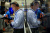 FILE PHOTO: Futures-options traders work on the floor at the New York Stock Exchange's NYSE American (AMEX) in New York City, U.S. July 16, 2026.  REUTERS/Brendan McDermid